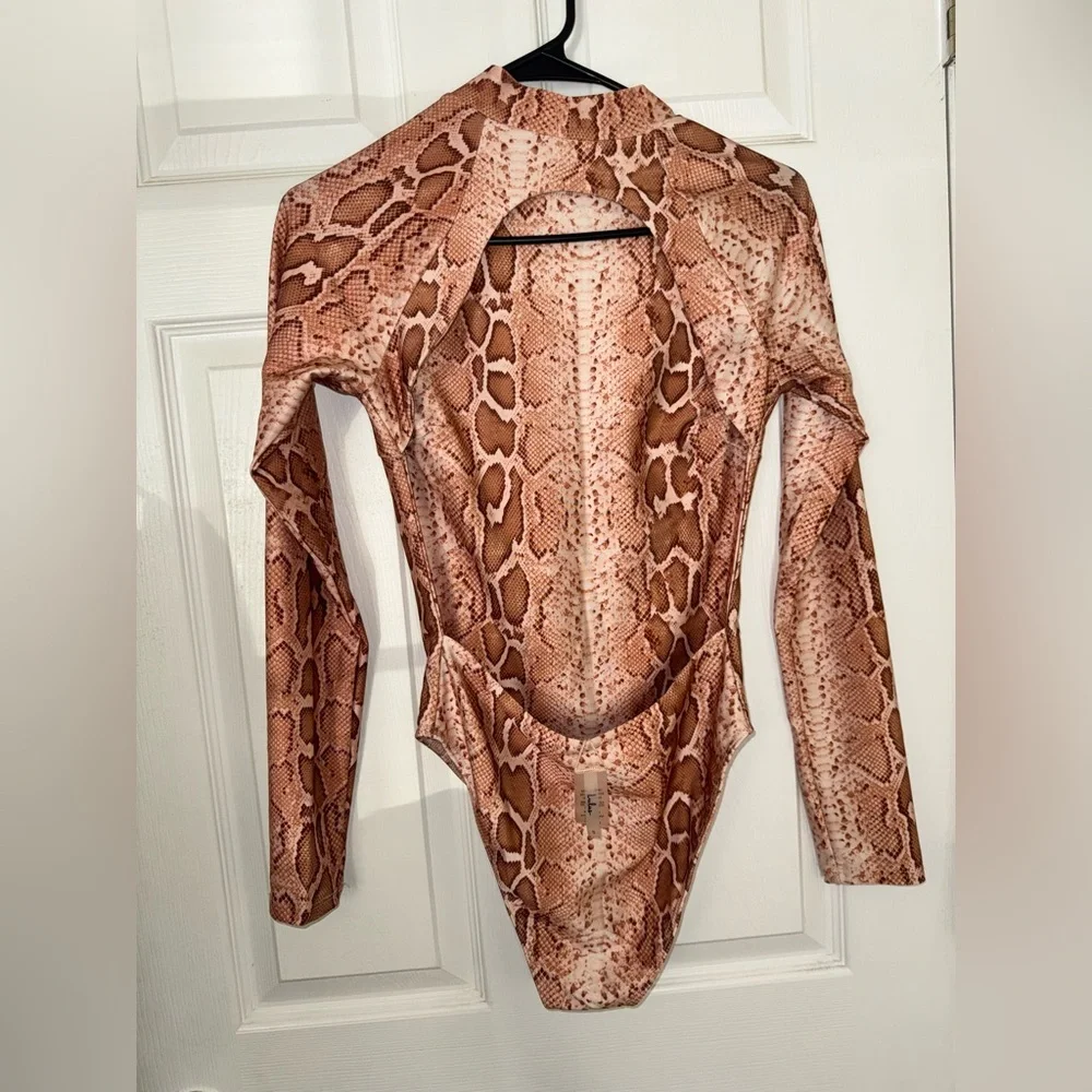 Wild Desires Tan Snake Print Long Sleeve One-Piece Swimsuit
Lulus - Picture 5 of 7